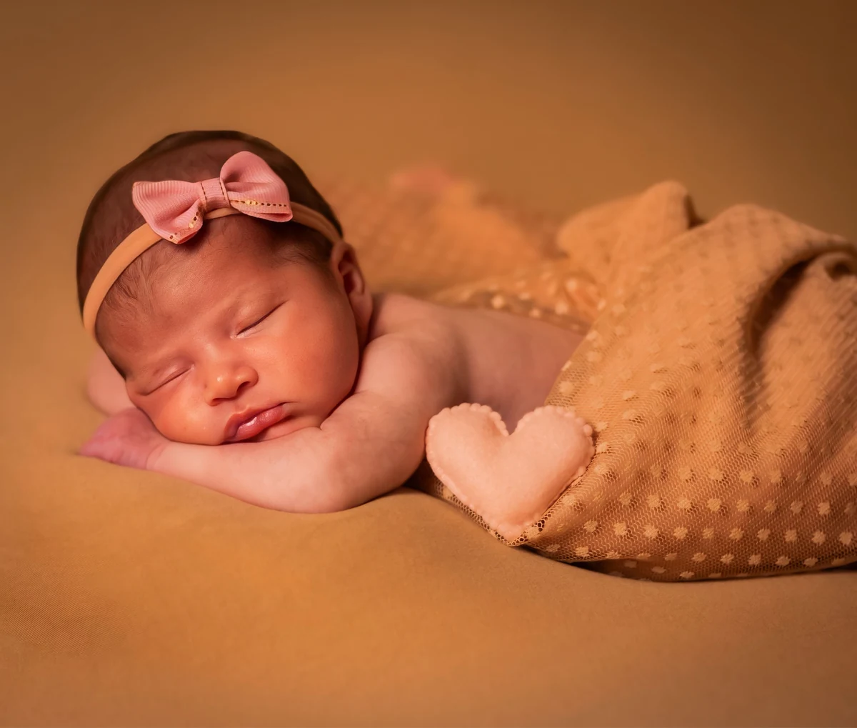 Exemplo de ensaio newborn feito pelo estúdio